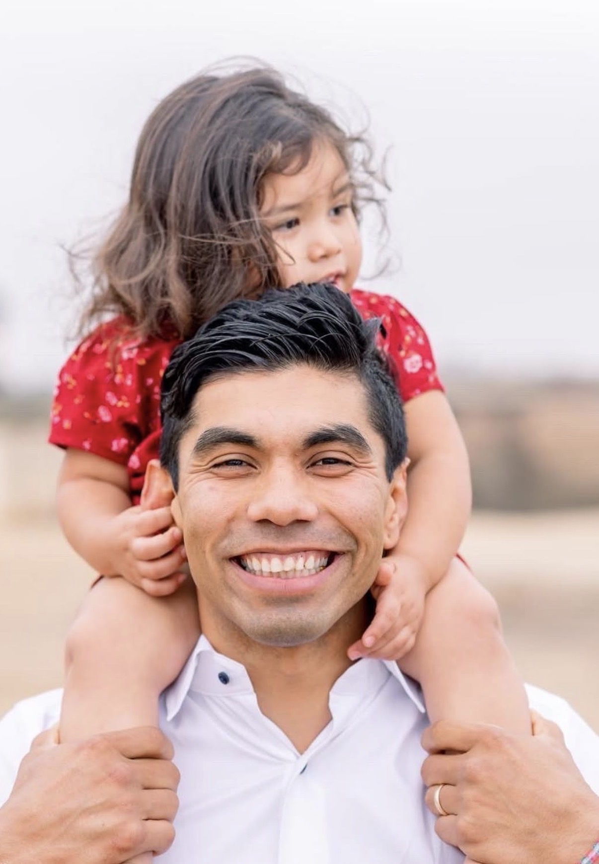 Commander Steven Mena with family
